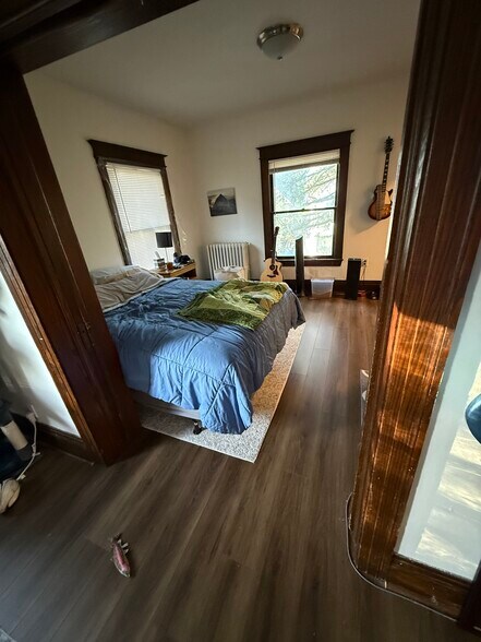 Current tenant view from living room with functioning pocket door - 1127 Monroe Ave