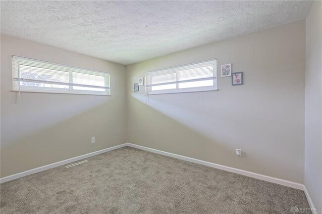 Building Photo - 5595 Shady Oak St