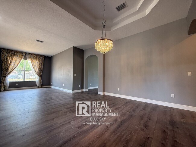 Building Photo - Executive Home with Custom Finishes in Gat...