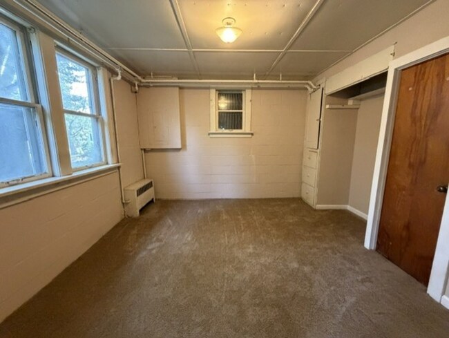 Building Photo - Three Levels of Living with 4 Bedrooms, 2 Full Bathrooms and Multiple Living Areas!