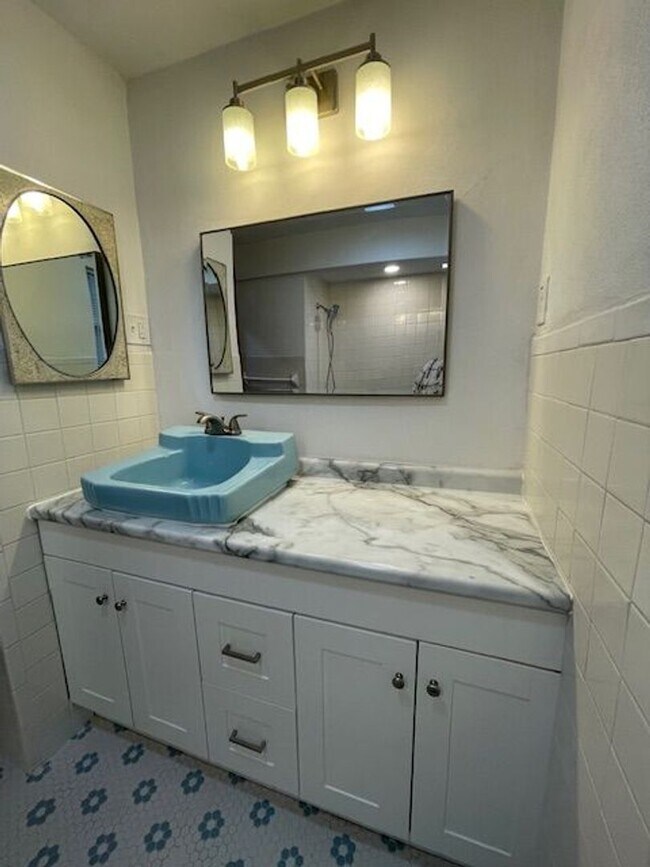 Building Photo - Charming 2-bedroom home, fully renovated and sharing 8 acres