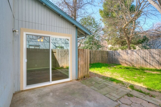 Building Photo - Greenwood Estates has an Excellent 2 Bedroom, 1.5 Bath Townhouse with a Backyard and Garage!