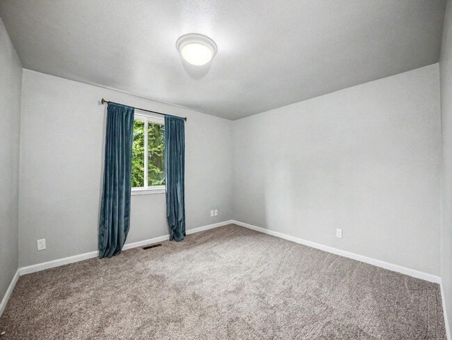 Building Photo - Spacious 4-Bedroom Lacey Home with A/C, Basement Bonus Space & Wetlands Privacy