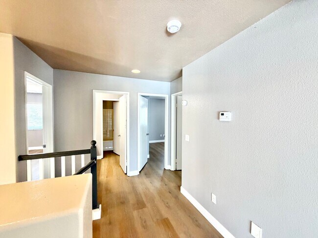Building Photo - Spacious 5 Bedroom Home with 3 Car Garage & Primary Suite Balcony