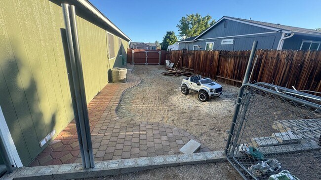 Building Photo - 4bed/2bath/2car garage. RV parking & massive landscaped backyard in cut-de-sac