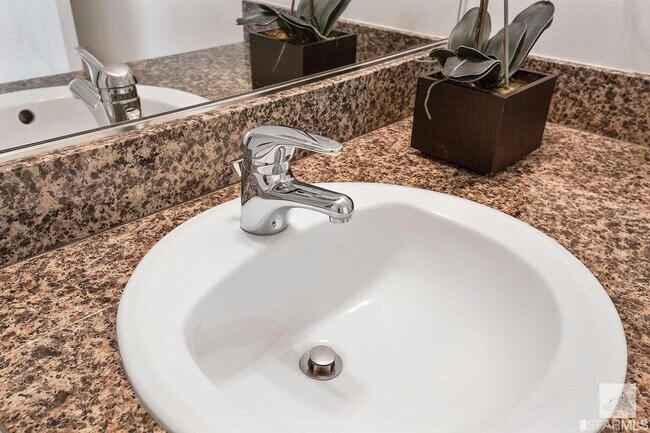 Building Photo - Spacious One-Bedroom Elegance in a Luxury Doorman Building with EV Parking