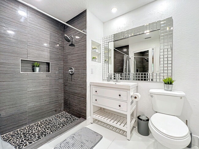 Building Photo - Seurat Street, Orlando, FL 32819 - 4 BR 2 BA condo