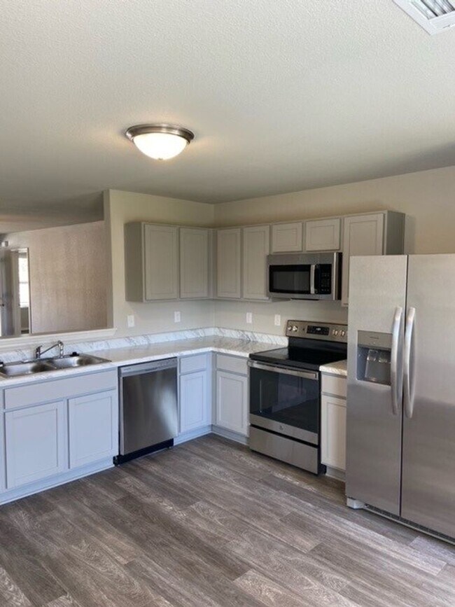Building Photo - Four Bedroom | Two Bathroom Home in Woods ...