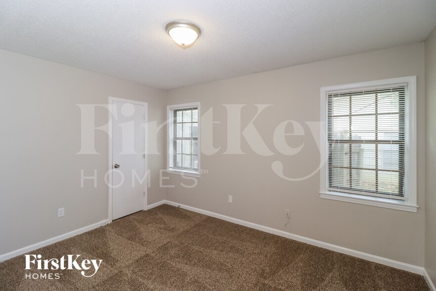 Building Photo - 5299 Twin Woods Ave