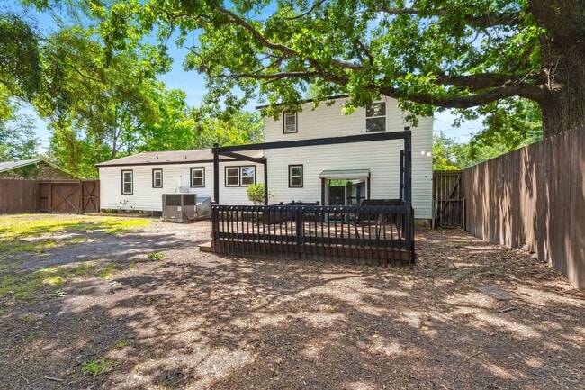 Building Photo - Spacious Split-Level Living with Dual Fireplaces & Expansive Deck