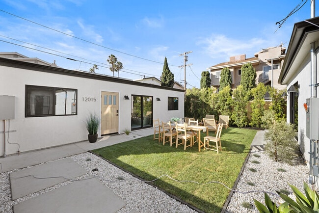 Building Photo - Brand-New Designer Home — 2 Bed + 2 Bath + Office | Gated Yard & Private Driveway Parking