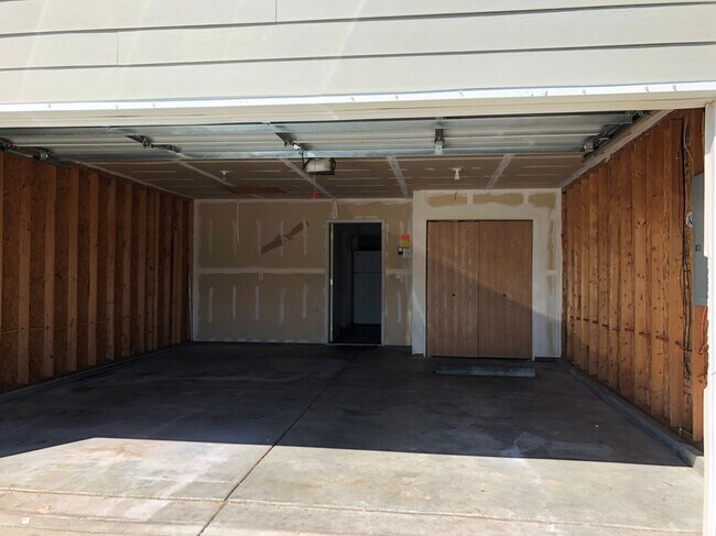 2 car garage with remote opener - 2619 E Conquest St