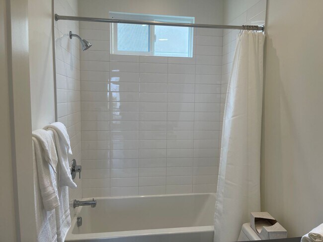 Building Photo - Water views! Less than a block from the ocean! 2 Bed 2.5 Bath Townhome!