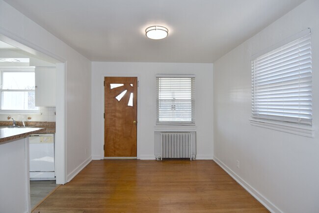 Dining room with access to sunroom and outdoor deck - 121 Owendale Ave