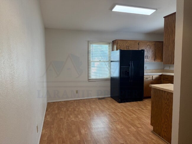 Building Photo - Single-Level 3-Bedroom Townhome with Primary Suite & Attached Garage