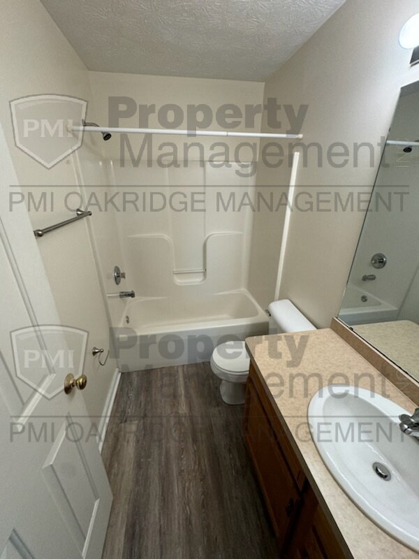Building Photo - Two Bedroom Townhome with Attached Garage