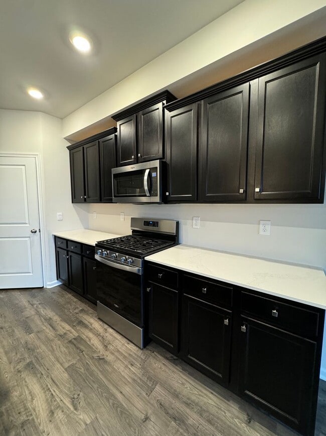 Building Photo - THREE BEDROOM NEW CONSTRUCTION PARKLAND SCHOOLS Townhome