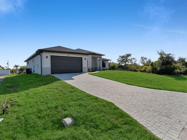 Building Photo - Brand-New Home for Rent – Port Charlotte, FL 33981. Qualify for a deposit-free option and save on...