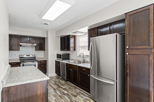 Building Photo - Charming 3BR with Fenced Yard