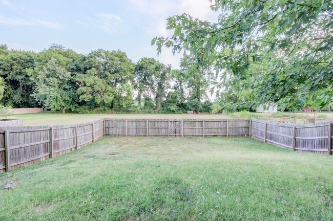 Building Photo - Stunning Brick Front Home With Fireplace A...