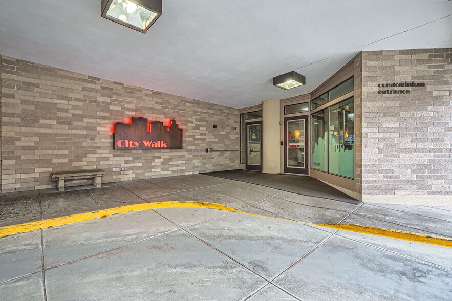 Secured entry with on-site security - 66 9th St E