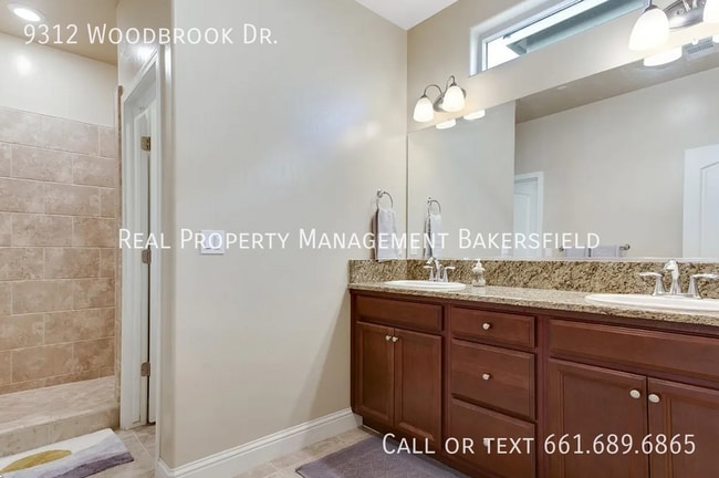 Building Photo - 9312 Woodbrook Dr