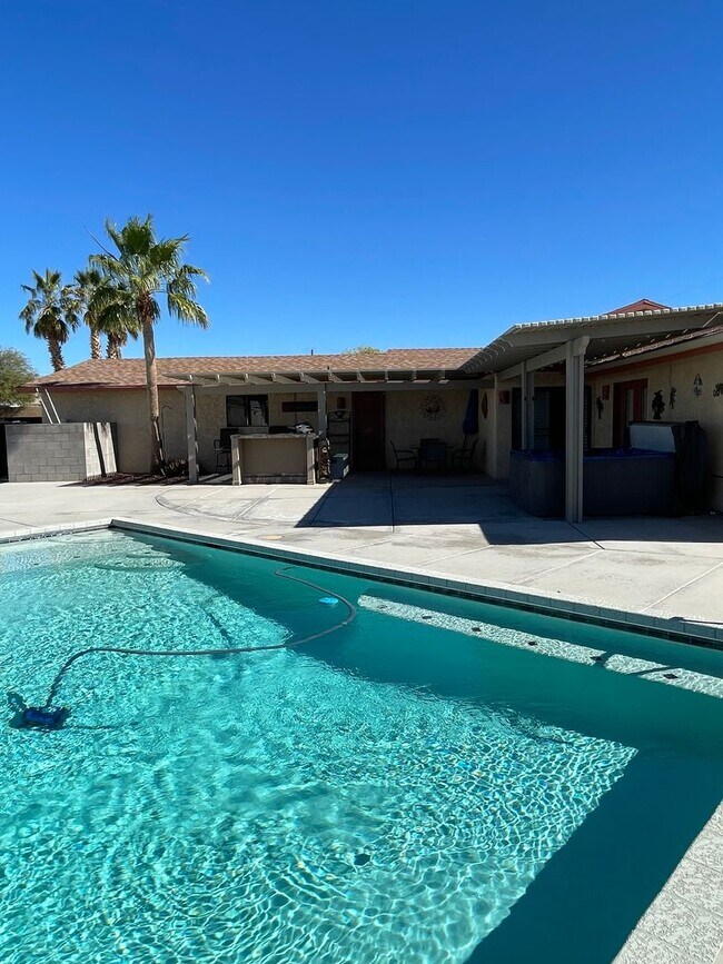 Building Photo - OWNER'S SUMMER SPECIAL-$300 OFF first 3 months! Sparkling Pool Home!