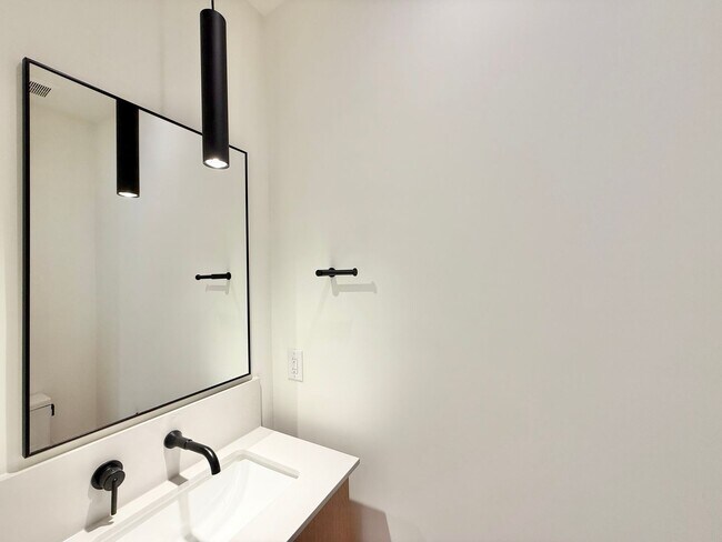 Building Photo - Luxurious New Construction 4BD, 2.5BA Raleigh Townhome with a Rooftop Terrace in a Prime Location...