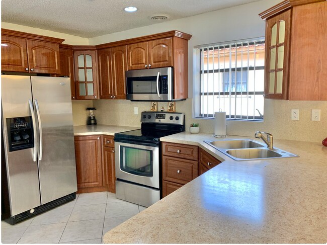 Building Photo - 6411 W 22nd Ct