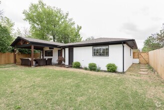 Building Photo - This complete remodel is centrally located...