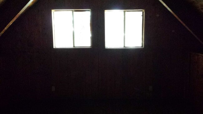 Building Photo - Rustic three bedroom with large lot.