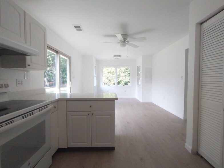 Dining area from kitchen - 211 Ash Ln