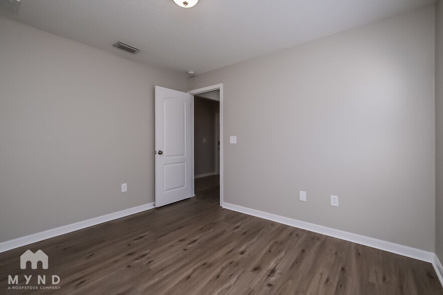 Building Photo - 8133 Alamosa Wood Ave