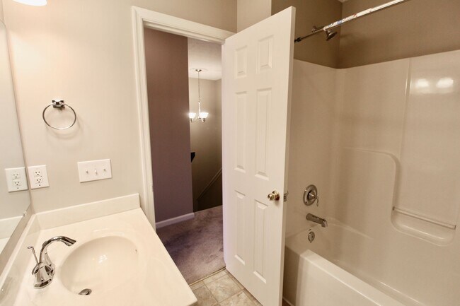 Building Photo - Upscale townhome  with attached garage for rent in the Townes at Bluestone!