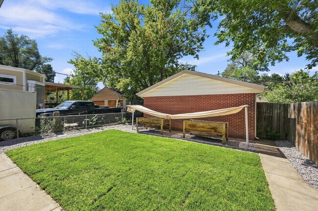 Building Photo - AVAILABLE NOW  Spacious 4-Bedroom Wheat Ridge Home with Finished Garden Level, Two-Car Garage & B...
