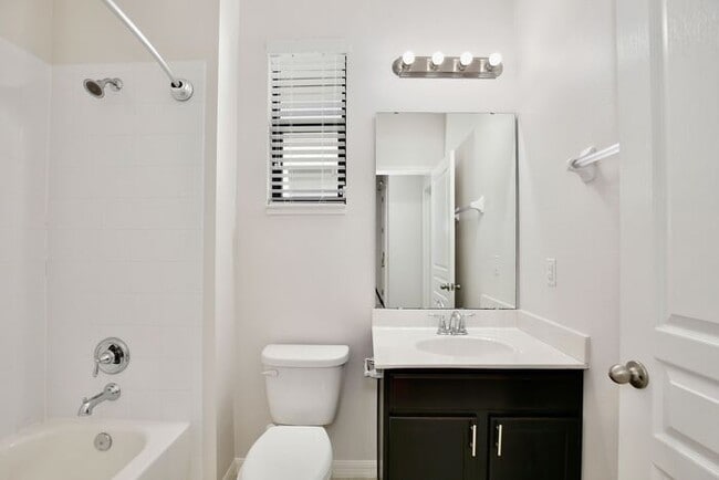Building Photo - Stylish 4/3 Home with Covered Patio & Gara...