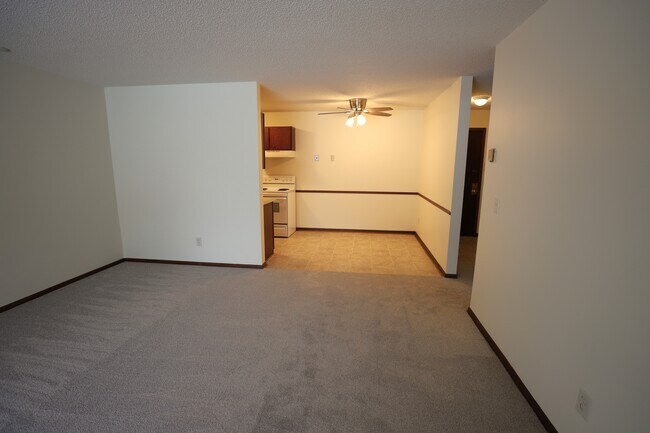 Living Room looking at Dining - Chalet Apartments