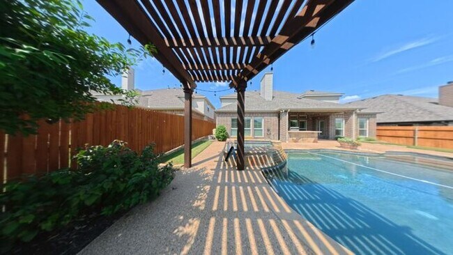 Building Photo - Immaculate 4-Bedroom Home with Luxury Upgr...