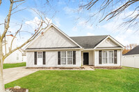 Building Photo - Inviting 3-Bedroom Home