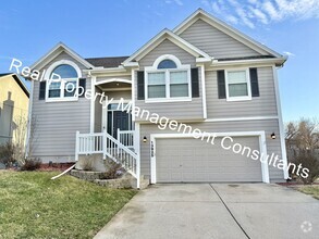 Building Photo - Spacious 4-Bedroom Reverse Split-Level in ...