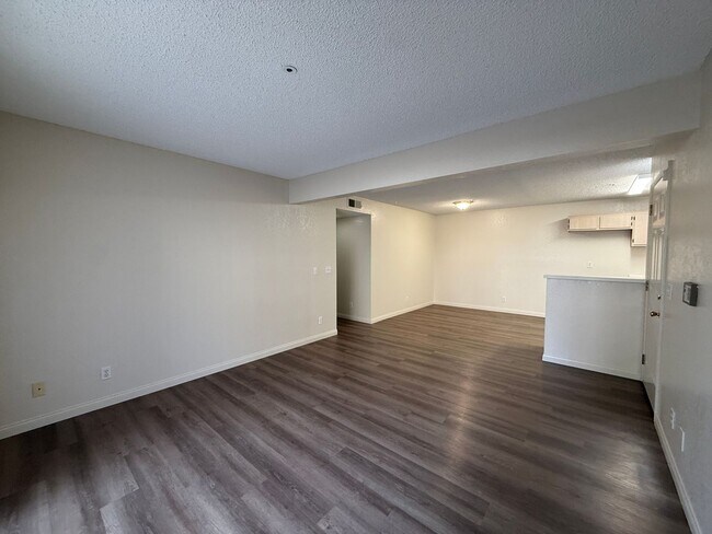 Building Photo - Downstairs Corner Condo in the Gated Commu...