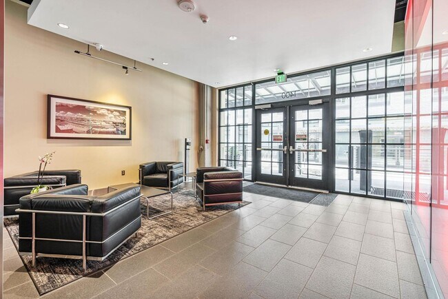 Building Photo - Stylish, south-facing 1-bdrm/1-bath loft in the Pearl—Deeded parking & storage