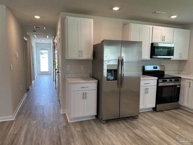 Building Photo - 6497 Firefly Dr