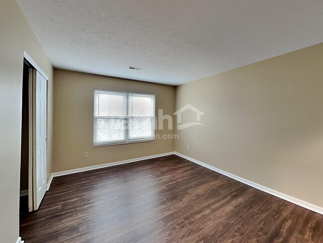 Building Photo - 6312 Satin Wood Dr