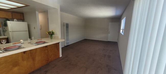 living and dinning area - 1571 W 207th St