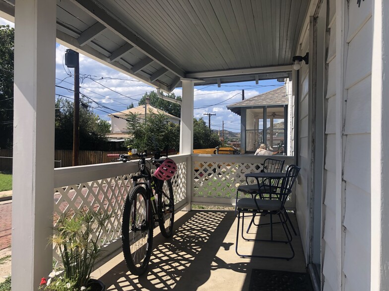 Seating area on the front porch - 414 S Commercial St