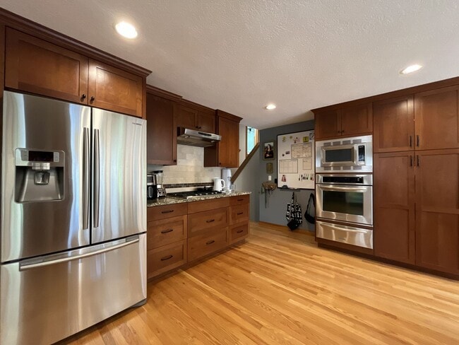 Building Photo - Bright and Open 4 Bedroom Cedar Mill Home with Vaulted Ceilings, Skylights & Multiple Living Areas