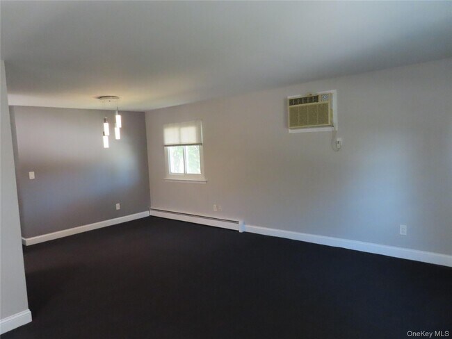 Building Photo - 1210 Smithtown Ave