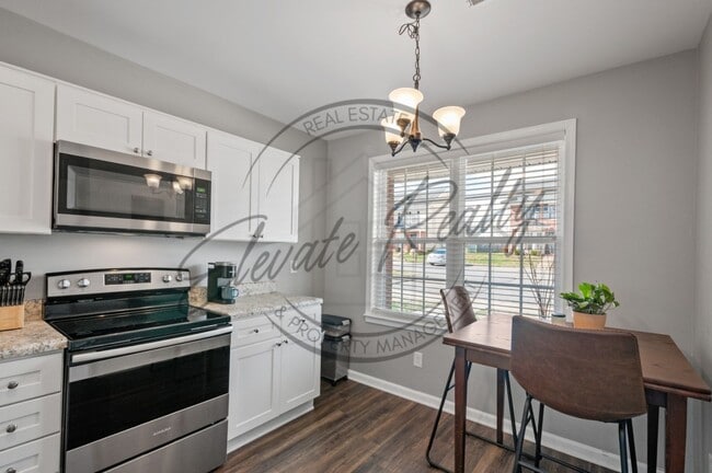 Building Photo - Two Bedroom, Two Story Townhouse located i...