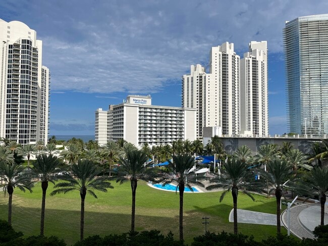 Building Photo - 19370 Collins Ave